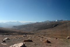 10 Mountains Ahead With Makalu Poking Up Above The Hills In Middle And Mount Everest On The Right From The Pass Between Tingri And Mount Everest North Base Camp In Tibet.jpg